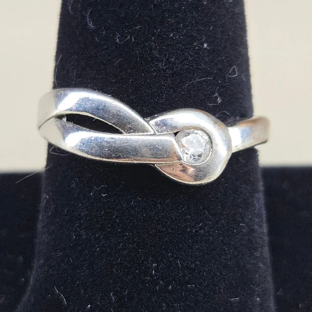 Silver Tone Infinity Knot Bypass Wrap Ring Clear Round Stone Size 10 AS IS